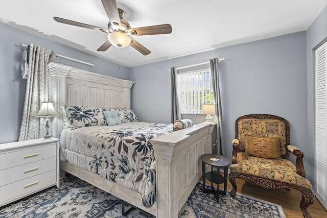 11711 Laurel Valley Cir, Wellington, FL 33414 - bedroom with a ceiling fan and wood finished floors