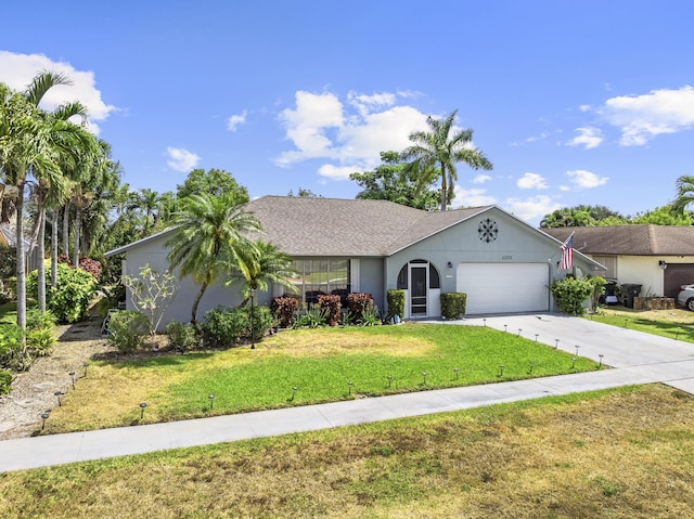 11711 Laurel Valley Cir, Wellington, FL 33414 - ranch-style home featuring concrete driveway, a garage, a front lawn, and a shingled roof