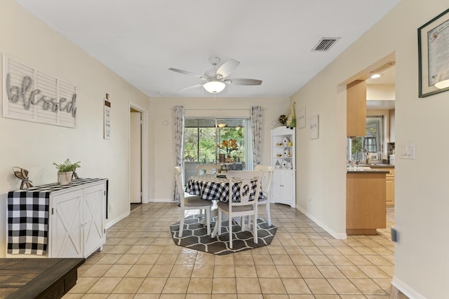 11711 Laurel Valley Cir, Wellington, FL 33414 - dining room with a ceiling fan, baseboards, light tile patterned floors, and visible vents
