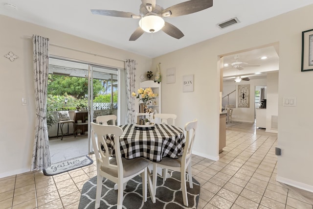11711 Laurel Valley Cir, Wellington, FL 33414 - dining area with light tile patterned flooring, visible vents, a ceiling fan, and a healthy amount of sunlight