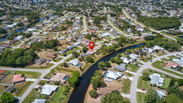 2449 SE Rock Springs Dr, Port Saint Lucie, FL 34952 - aerial view of property's location featuring nearby suburban area and a nearby body of water
