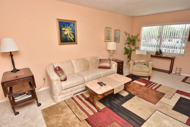1225 NW 21st St Unit 2010, Stuart, FL 34994 - carpeted living area featuring baseboards