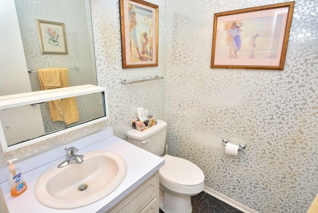 1225 NW 21st St Unit 2010, Stuart, FL 34994 - half bath featuring vanity, wallpapered walls, and toilet
