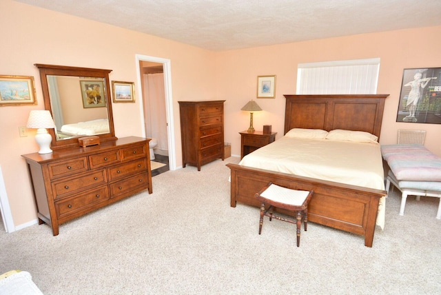 1225 NW 21st St Unit 2010, Stuart, FL 34994 - bedroom featuring light carpet