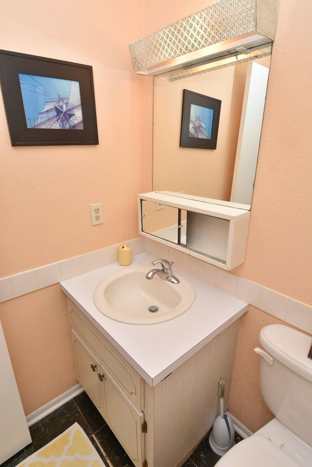 1225 NW 21st St Unit 2010, Stuart, FL 34994 - half bathroom with vanity and toilet