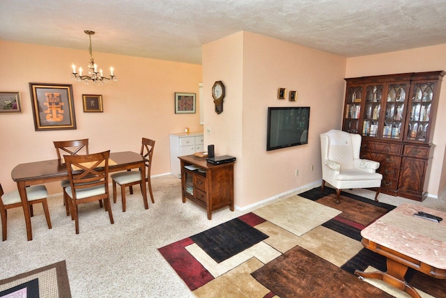 1225 NW 21st St Unit 2010, Stuart, FL 34994 - dining room with baseboards and a chandelier