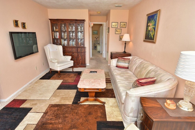 1225 NW 21st St Unit 2010, Stuart, FL 34994 - living room featuring baseboards and visible vents