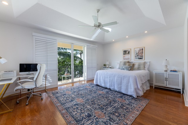 bedroom with recessed lighting, a ceiling fan, a raised ceiling, and wood finished floors