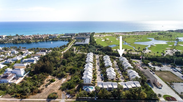 aerial view featuring a water view, a residential view, and golf course view