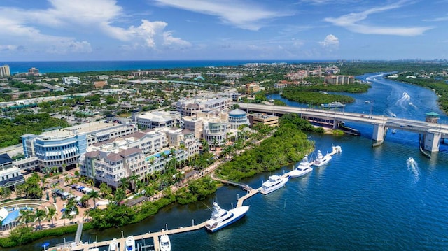 birds eye view of property featuring a water view