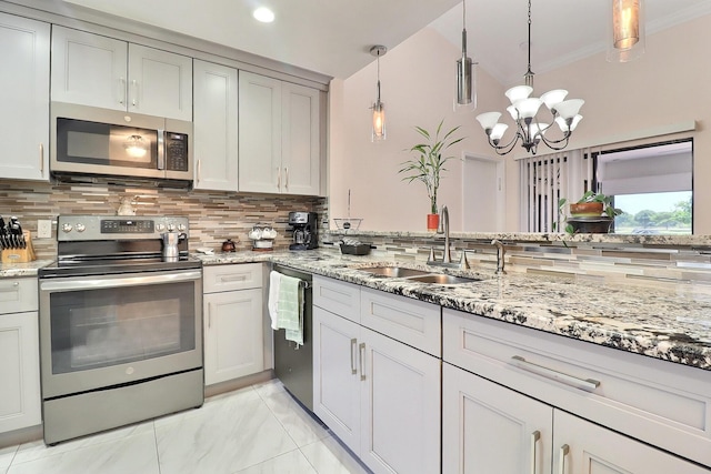 8216 Waterline Dr, Boynton Beach, FL 33472 - kitchen featuring a sink, appliances with stainless steel finishes, and decorative backsplash