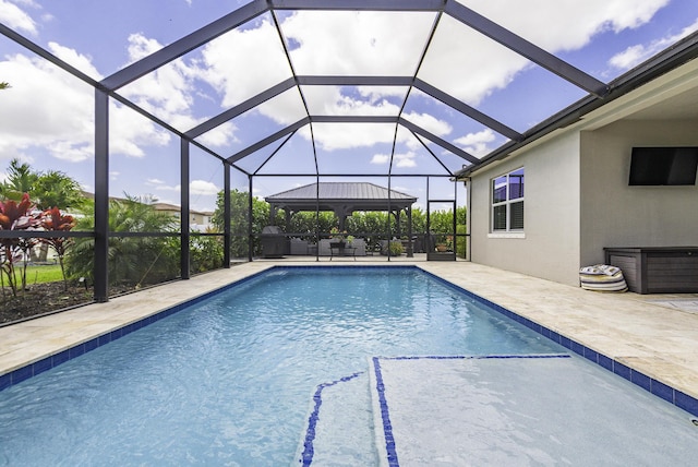 outdoor pool featuring a gazebo, a lanai, and a patio area