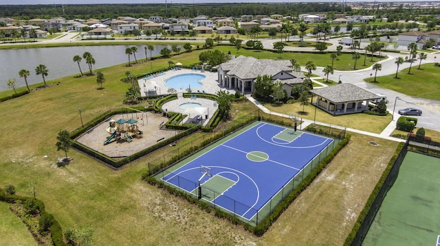 view of basketball court featuring a water view, community basketball court, and a residential view