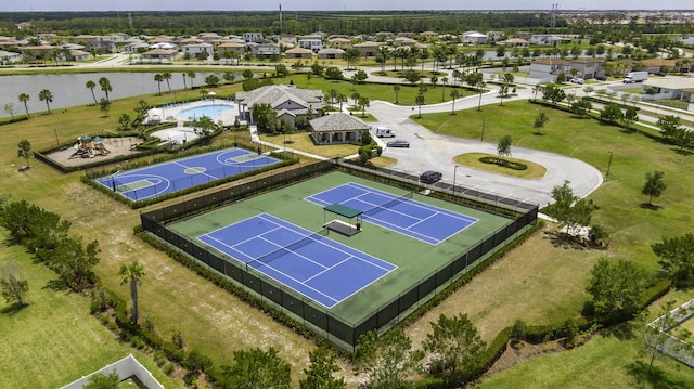 birds eye view of property featuring a water view and a residential view