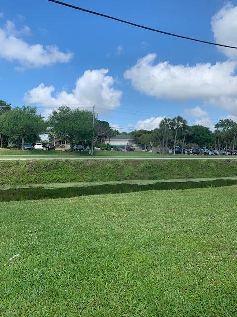 2821 Duke Ln, Delray Beach, FL 33445 - view of home's community with a yard