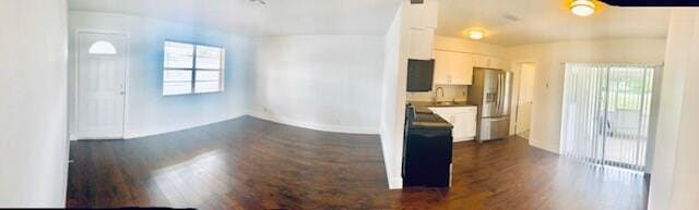 2821 Duke Ln, Delray Beach, FL 33445 - interior space featuring baseboards and dark wood finished floors