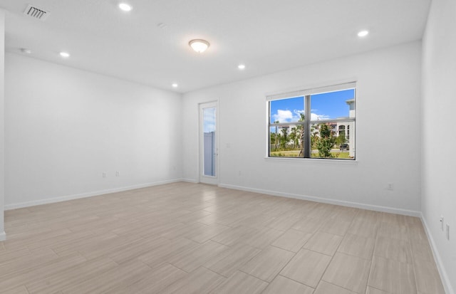 7646 SW Lucy Ln Unit 52-10, Stuart, FL 34997 - unfurnished room featuring recessed lighting and baseboards