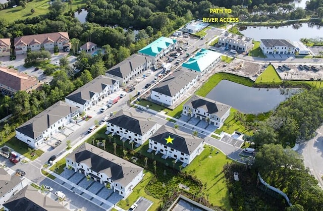 7646 SW Lucy Ln Unit 52-10, Stuart, FL 34997 - aerial view of property and surrounding area featuring a nearby body of water