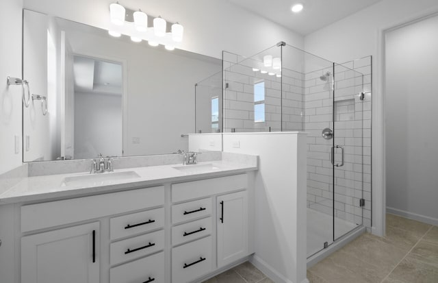7636 SW Lucy Ln Unit Latitude 48-09, Stuart, FL 34997 - full bath featuring a shower stall, double vanity, and tile patterned flooring