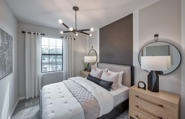 7636 SW Lucy Ln Unit Latitude 48-09, Stuart, FL 34997 - bedroom featuring a chandelier, carpet floors, and baseboards