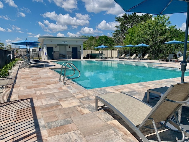 7636 SW Lucy Ln Unit Latitude 48-09, Stuart, FL 34997 - community pool featuring a patio area