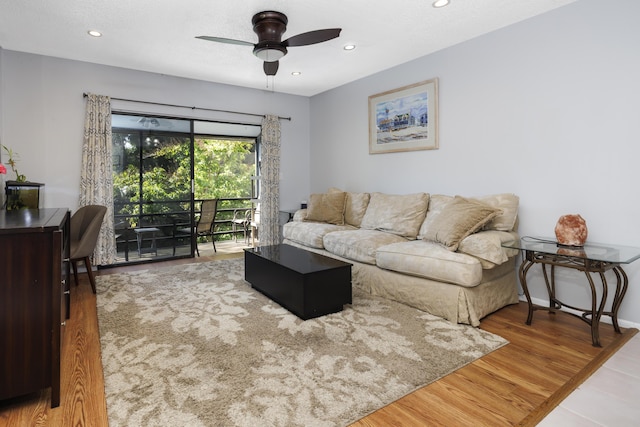 living room with recessed lighting, a ceiling fan, and wood finished floors