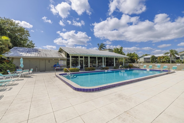 pool featuring a patio area