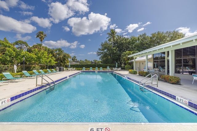 community pool featuring a patio