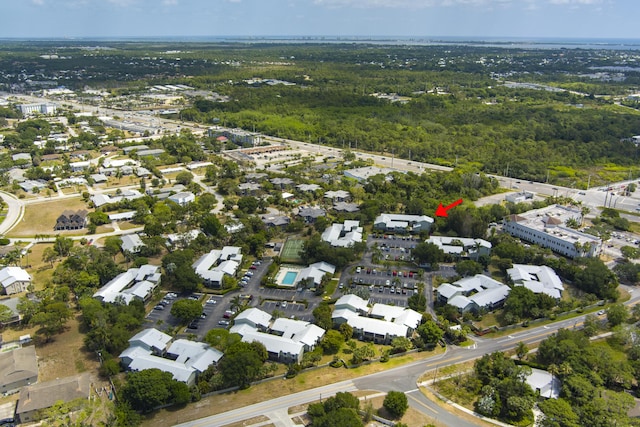 aerial view featuring a view of trees