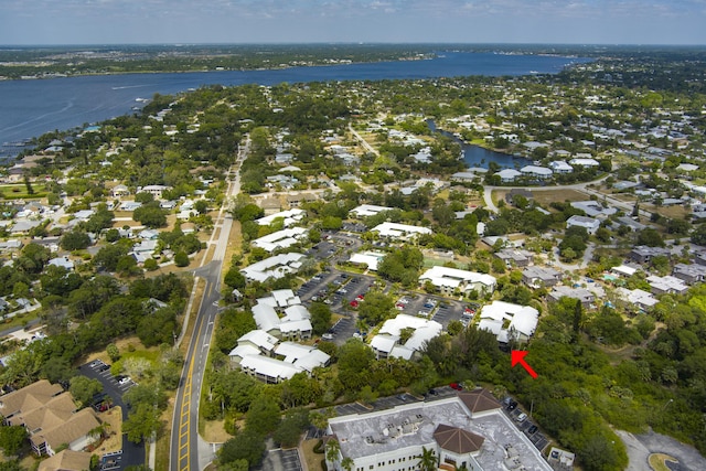 aerial view featuring a water view and a residential view