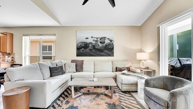 living room with a ceiling fan