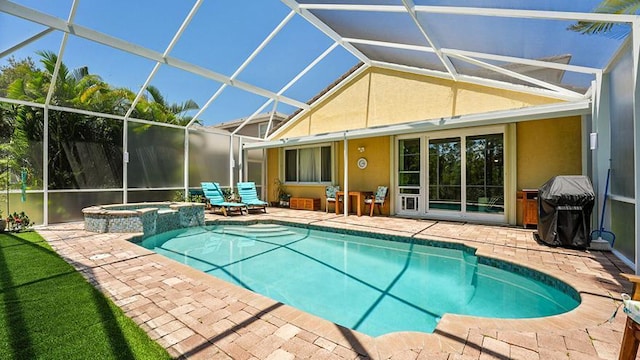 view of swimming pool featuring a patio area, a grill, a pool with connected hot tub, and a lanai