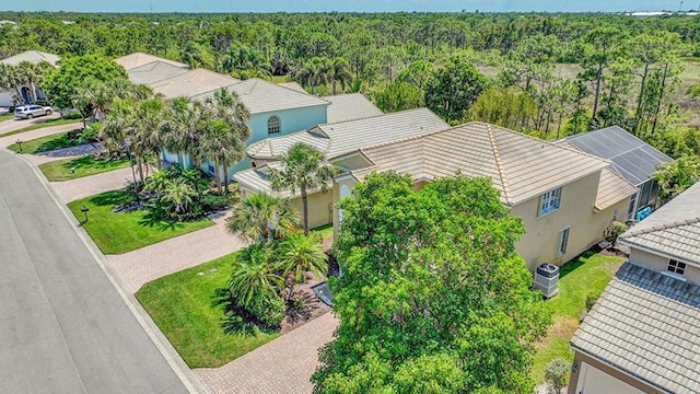 drone / aerial view of a heavily wooded area