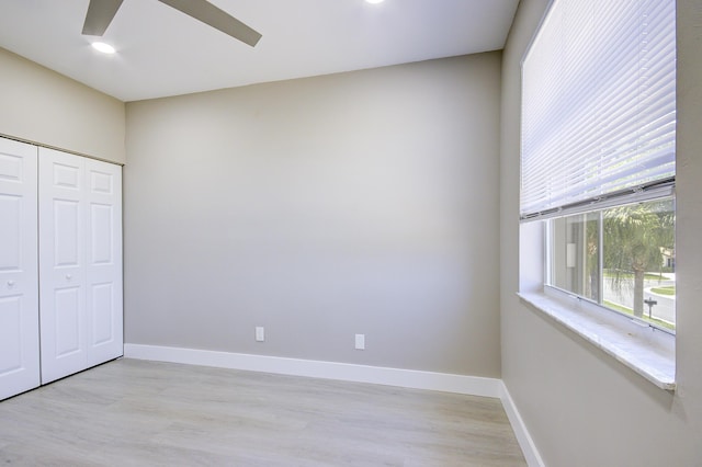 7861 Manor Forest Ln, Boynton Beach, FL 33436 - unfurnished bedroom featuring light wood-style floors, a closet, baseboards, recessed lighting, and ceiling fan