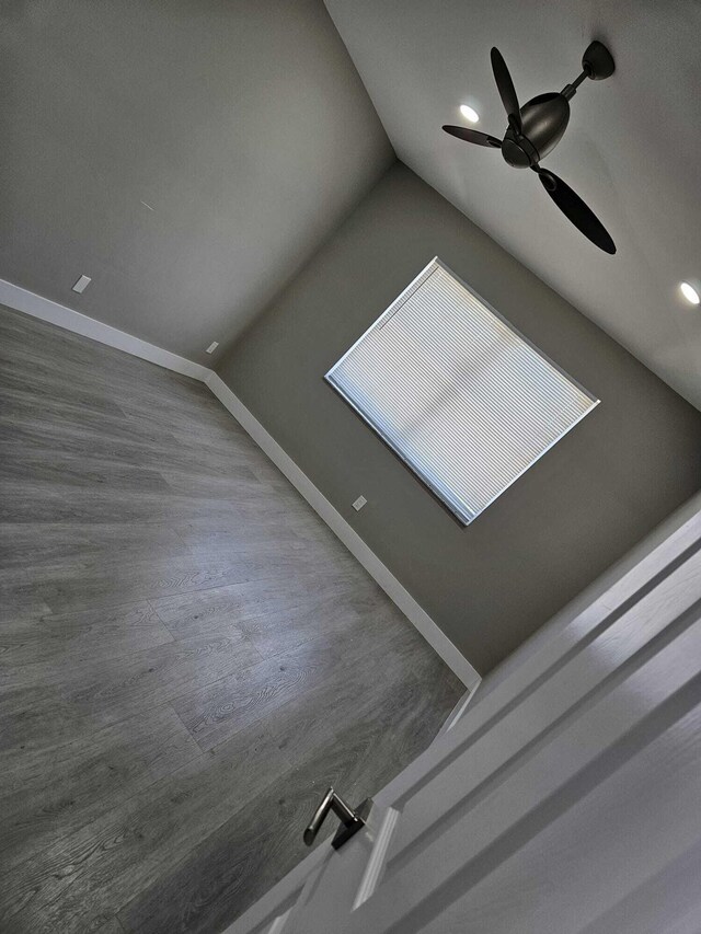 7861 Manor Forest Ln, Boynton Beach, FL 33436 - detailed view of baseboards, ceiling fan, and wood finished floors