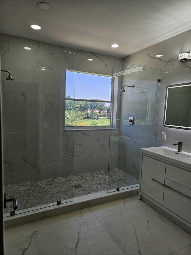 7861 Manor Forest Ln, Boynton Beach, FL 33436 - bathroom with marble finish flooring, a marble finish shower, vanity, and recessed lighting