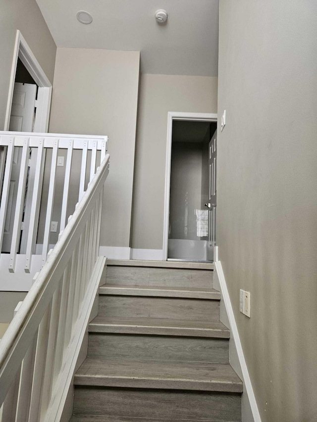 7861 Manor Forest Ln, Boynton Beach, FL 33436 - staircase featuring baseboards