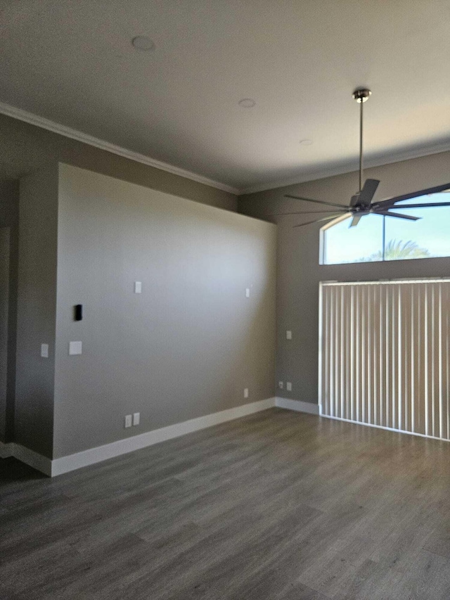 7861 Manor Forest Ln, Boynton Beach, FL 33436 - empty room with crown molding, wood finished floors, ceiling fan, and baseboards