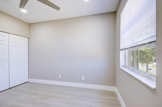 7861 Manor Forest Ln, Boynton Beach, FL 33436 - unfurnished bedroom with light wood-type flooring, a closet, baseboards, recessed lighting, and a ceiling fan
