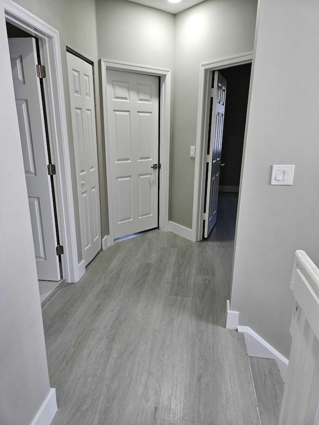7861 Manor Forest Ln, Boynton Beach, FL 33436 - hall featuring wood finished floors and baseboards