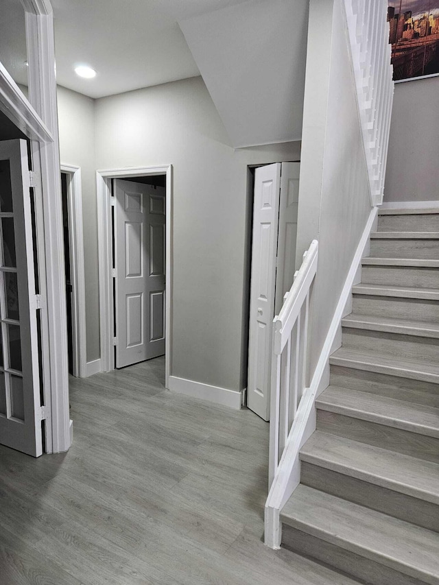 7861 Manor Forest Ln, Boynton Beach, FL 33436 - staircase with wood finished floors and baseboards