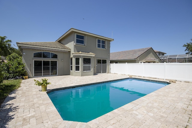 7861 Manor Forest Ln, Boynton Beach, FL 33436 - view of swimming pool with a patio and a fenced backyard