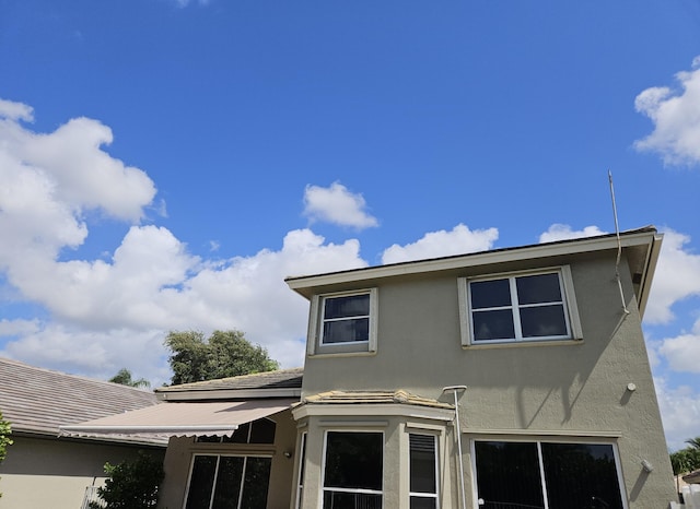 7861 Manor Forest Ln, Boynton Beach, FL 33436 - view of side of home with stucco siding