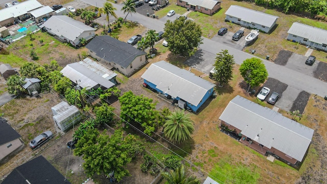 1043 NE 20th St, Belle Glade, FL 33430 - drone / aerial view with a residential view