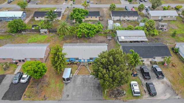 1043 NE 20th St, Belle Glade, FL 33430 - aerial view with a residential view