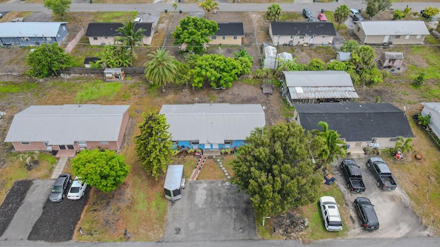 1043 NE 20th St, Belle Glade, FL 33430 - drone / aerial view featuring a residential view