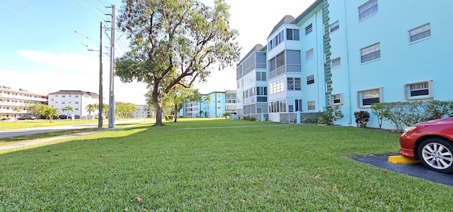 4141 NW 44th Ave Unit 217, Lauderdale Lakes, FL 33319 - surrounding community featuring a yard