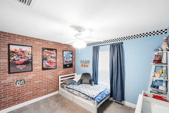 1566 SW Andalusia Rd, Port Saint Lucie, FL 34953 - carpeted bedroom with baseboards, a ceiling fan, brick wall, and visible vents