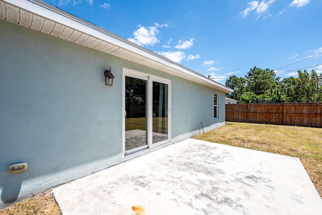 1566 SW Andalusia Rd, Port Saint Lucie, FL 34953 - view of patio / terrace featuring fence