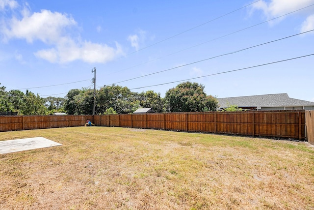 1566 SW Andalusia Rd, Port Saint Lucie, FL 34953 - view of yard with a fenced backyard